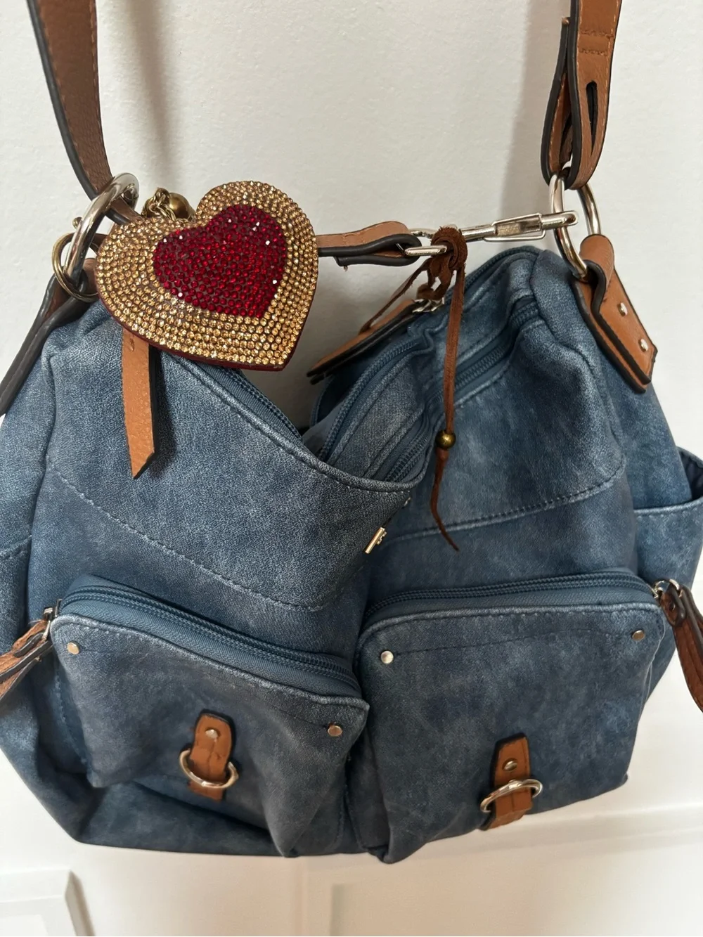 hobo-style shoulder bag denim-look faux leather in blue.